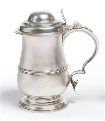 Lot 215 - A George III Tankard, maker's mark JS, London 1773, of typical form with raised girdle band,...