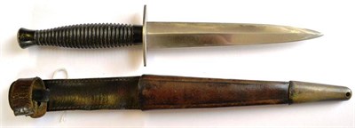 Lot 280 - A French Super-Nogent Inox `Le Commando' Fighting Knife, with machine forged steel blade, white...