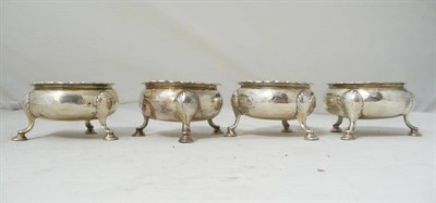 Lot 217 - A Set of Four George II Salt Cellars, David Hennell, London 1750-54, of cauldron form on three leaf