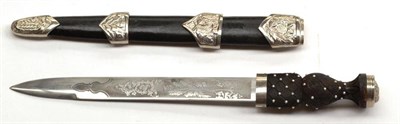 Lot 336 - A Copy of a Highland Dirk, the blade with laser etched decoration of thistles, with basket...