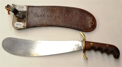 Lot 338 - A US Military Machete Type Knife, the 30cm single edge rounded flat steel blade stamped US...