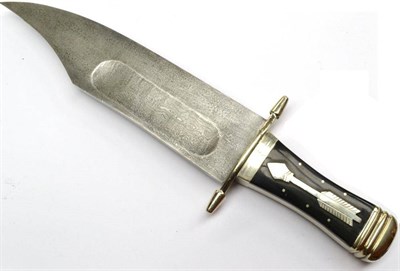 Lot 341 - A Massive Indian Bowie Knife, with 30cm broad hatchet tip damascus steel blade, the nickel...