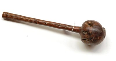 Lot 356 - A 19th Century Fijian Ula (Throwing Club), the globular head with seven natural crevices, on a...