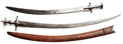 Lot 365 - A 19th Century Indian Talwar, the 83cm broad curved steel blade double edged towards the tip,...