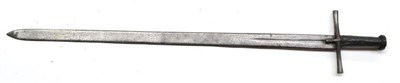 Lot 373 - An Early 19th Century Sudanese Kaskara, the 90cm broad double edge steel blade with a central...