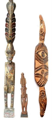 Lot 386 - A Papua New Guinea Small Wood Figure, with tall conical headdress, oval face with hooked nose, on a