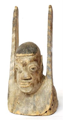 Lot 391 - A Fon Wood Dance Mask, Nigeria, carved as the head and shoulders of a man with flat upraised...