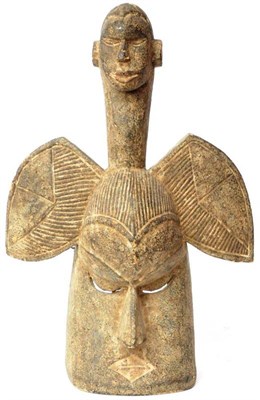 Lot 392 - A Dogon Wood Mask, Mali, the square face with large triangular nose, closed lozenge shape mouth and