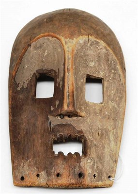 Lot 401 - A Dogon Wood Mask, Mali, with domed forehead, pierced square eyes set in concave face with...