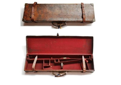 Lot 412 - A Late Victorian/Edwardian Stitched Leather Shotgun Case, with brass bound angles and lock, the...