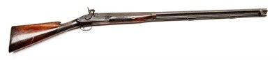 Lot 512 - A 19th Century Percussion Single Barrel Sporting Gun, with 86cm steel barrel, foliate engraved...