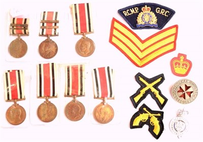 Lot 8 - A Collection of Seven Special Constabulary Long Service Medals, comprising two George V, each...