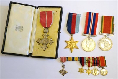 Lot 13 - An MBE Group of Four Medals, awarded to 134118 J.E.BEVERIDGE, comprising MBE Breast Badge (Mily) in