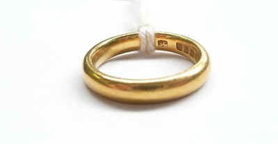 Lot 248 - A 22 Carat Gold Band Ring, the D shaped plain band is finger size K