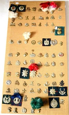 Lot 67 - A Collection of Eighty Six British Military Cap, Glengarry and Collar Badges, in brass, white metal