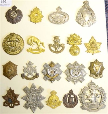 Lot 84 - A Collection of Nineteen Second World War Canadian Cap Badges, in brass, bi-metal and white...