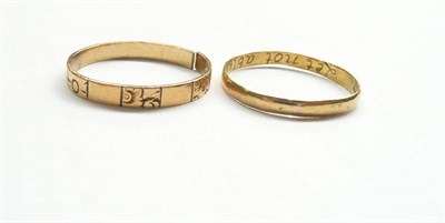 Lot 250 - A Posy Ring, the plain polished band engraved to the inside Let Not Absence Banish Love, finger...