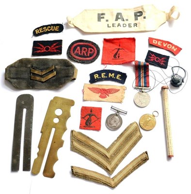 Lot 118 - A Small Quantity of Militaria, comprising a Harper Overhead Height Check Rule for identifying...