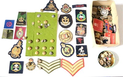 Lot 122 - A Quantity of Militaria, including cap badges, buttons, belt clasps, rank badges and cloth...