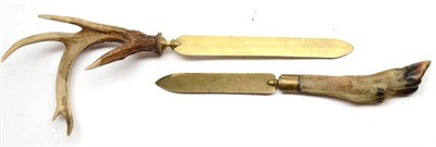 Lot 135 - Two Brass Page Turners, one with an antler handle, the other with deer's foot handle