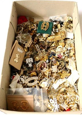 Lot 151 - A Large Collection of Military Badges, mainly collar dogs and shoulder titles, in brass, white...