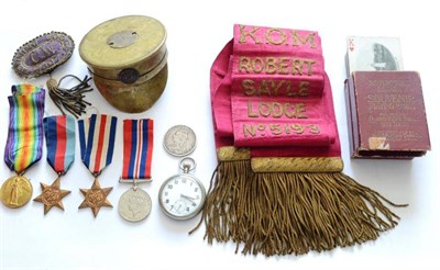 Lot 158 - A Collection of Militaria, comprising a white metal cased top wind military pocket watch, a Victory