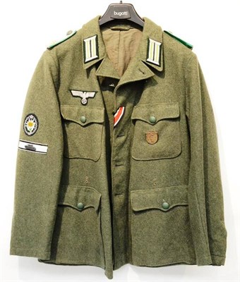 Lot 207 - A Copy of a German Third Reich Army Tunic, with shoulder straps to an Oberleutnant, with breast...