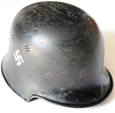 Lot 221 - A German Third Reich M34 Police Helmet, double decals, the inner back brim stamped with a recumbent