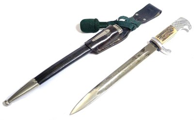 Lot 235 - A German Third Riech Feldjager Dress Bayonet, the single edge fullered steel blade with etched...