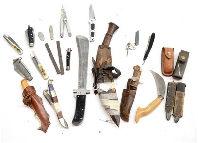 Lot 247 - A Collection of Knives and Daggers, including a Leatherman Wave multi tool, a kukri, a pattern...