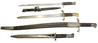 Lot 253 - A British Model 1856 Sword Bayonet, with steel mounted leather scabbard; a Scarce British...