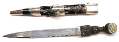 Lot 282 - A Ceremonial Dirk to the Scots Guards, with 30cm scallop back steel blade, the ebonised wood...