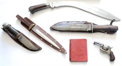 Lot 284 - A 19th Century Nepalese Kukri, with double fullered curved steel blade, the rosewood grip with...