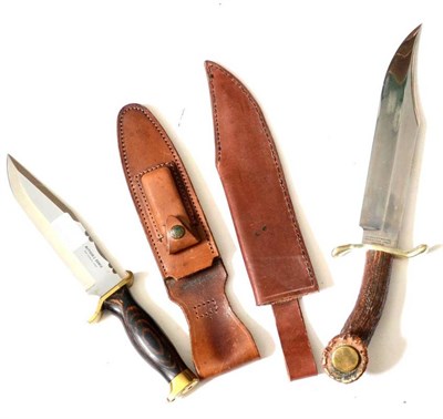 Lot 305 - A Bowie knife by J E Middleton, Sheffield, with 25cm clip point steel blade, German silver...