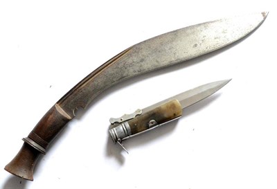 Lot 326 - A Nepalese Kukri, with ring knopped wood grip, lacks scabbard; a Folding Lock Knife, the blade...