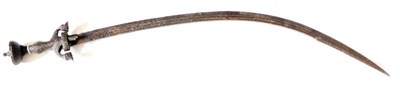 Lot 352 - A 17th Century Indian Pulwar Sword, the 76cm single edge deep curved steel blade with space set...