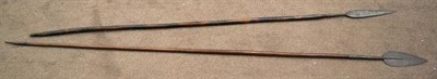 Lot 381 - Two African Spears, one with broad leaf shape blade with medial ridge, folded socket, wood haft...