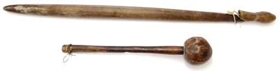 Lot 392 - A Large Ironwood Pole Club, of rounded cylindrical form, tapering to a point at each end, the...