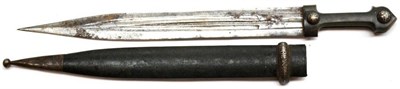 Lot 401 - A Late 19th/Early 20th Century Caucasian Kindjal, the 42cm double edge pointed steel blade with...