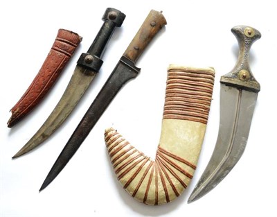 Lot 405 - A 19th Century Indian Pesh Kabz, with straight T section steel blade and horn grip scales,...