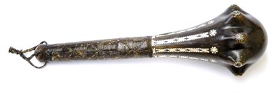 Lot 407 - A 20th Century Solomon Islands Dark Hardwood Throwing Club, the eight lobed globular head set...