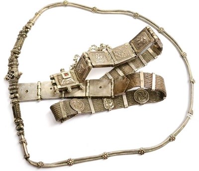 Lot 430 - An Indian Silver Coloured Metal Belt, made up of plaited lace and square panelled links worked with