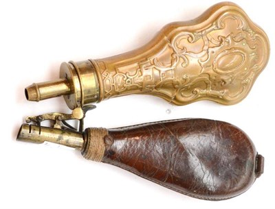 Lot 446 - A 19th Century Copper Powder Flask, of violin shape, embossed with foliate strapwork, with...