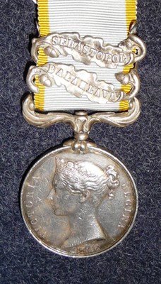 Lot 287 - A Crimea Medal 1854, with two clasps BALACLAVA and SEBASTOPOL, awarded to WM.ARGENT. R.M. (possibly