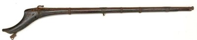 Lot 518 - A 19th Century Indian Matchlock Musket, the 96cm steel barrel with flared muzzle, five band...