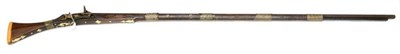 Lot 520 - A 19th Century Indian Miquelet Lock Long Gun, the 146cm octagonal steel barrel inlaid with bands of