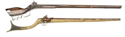 Lot 529 - A 19th Century Afghan Miquelet Musket, with 71cm steel barrel, brass covered wood stock with...