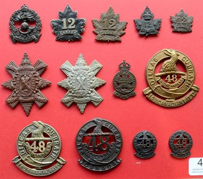 Lot 46 - A Collection of Thirteen First World War Canadian Cap and Collar Badges, to the 11th Infantry (11th