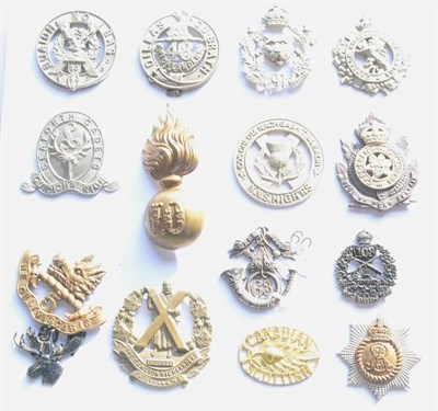 Lot 60 - A Collection of Fifteen Canadian Cap Badges 1900 - 1914, in brass, bronze, bi-metal and white...