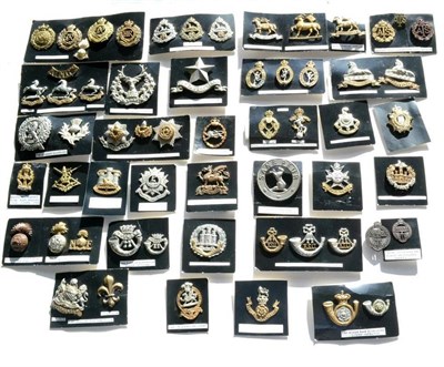 Lot 61 - A Collection of Sixty Military Cap Badges, including Scottish, Line Regiments and Service Corps, in